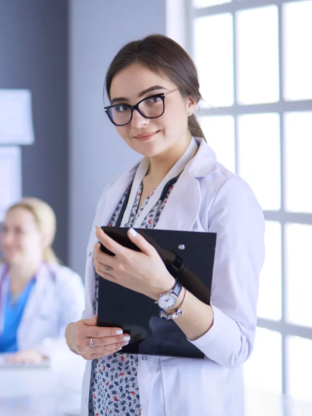 woman-doctor-standing-with-stethoscope-hospital